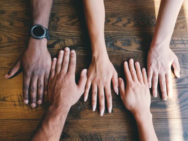 Holding hands to show unity